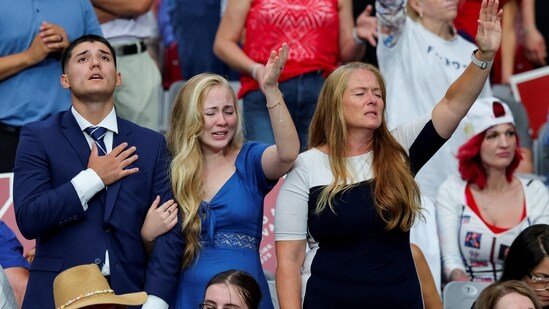 People gather to attend a memorial service for slain conservative commentator Charlie Kirk at State Farm Stadium, in Glendale, Arizona, U.S., September 21, 2025. REUTERS/Daniel Cole TPX IMAGES OF THE DAY(REUTERS)