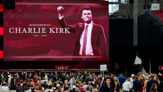 A large screen displays a message in memory of slain conservative commentator Charlie Kirk, as people gather to attend a memorial service, at State Farm Stadium, in Glendale, Arizona, U.S., September 21, 2025. REUTERS/Daniel Cole(REUTERS)