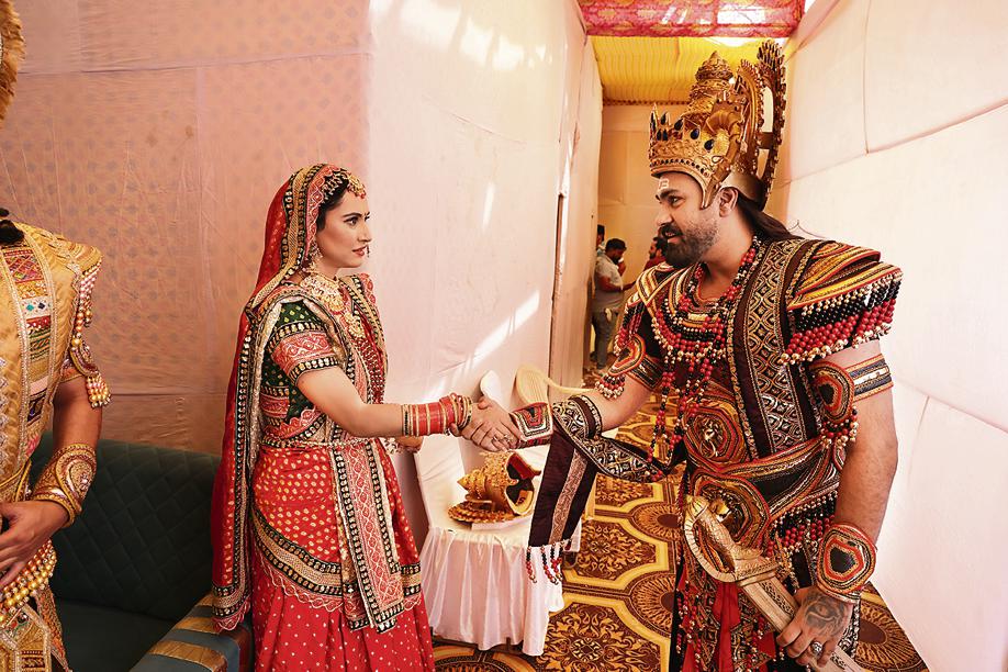 Sita haran prep? Actor Arya Babbar, dressed in his character of Ravana, greets Riney Aryaa (playing Sita) in the green room. Sita haran prep? Actor Arya Babbar, dressed in his character of Ravana, greets Riney Aryaa (playing Sita) in the green room.