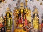 Devotees offer prayer to Goddess Durga during the Durga Puja and Navratri festivals. 