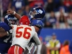 Russell Wilson #3 of the New York Giants is hit by George Karlaftis #56 of the Kansas City Chiefs during the fourth quarter at MetLife Stadium. Russell Wilson #3 of the New York Giants is hit by George Karlaftis #56 of the Kansas City Chiefs during the fourth quarter at MetLife Stadium.