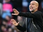 Manchester City manager Pep Guardiola gestures on the touchline during the English Premier League game against Arsenal at the Emirates Stadium in London on Sunday. (AFP)
