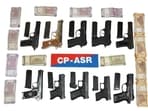 The 10 pistols,  <span class='webrupee'>₹</span>2.5 lakh Hawala money recovered from the accused in Amritsar on Monday. (HT File)