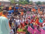 Farmers protest in Ujjain over the land pooling policy.