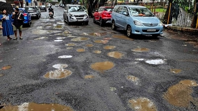 State President B Y Vijayendra highlighted public frustration over potholes, in Bengaluru, as citizens demand immediate repairs. (Photo by Vijay Bate/HT Photo) State President B Y Vijayendra highlighted public frustration over potholes, in Bengaluru, as citizens demand immediate repairs. (Photo by Vijay Bate/HT Photo)