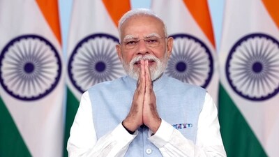 New Delhi, Sep 21 (ANI): Prime Minister Narendra Modi greets before addressing the nation, in New Delhi on Sunday. (DD/ANI Video Grab) (DD)