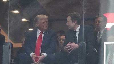 From left, Dana White, President Donald Trump, Elon Musk and House Speaker Mike Johnson, R-La., talk at a memorial for Charlie Kirk, Sunday, Sept. 21, 2025, at State Farm Stadium in Glendale, Ariz. (AP Photo/Ross D. Franklin) (AP) From left, Dana White, President Donald Trump, Elon Musk and House Speaker Mike Johnson, R-La., talk at a memorial for Charlie Kirk, Sunday, Sept. 21, 2025, at State Farm Stadium in Glendale, Ariz. (AP Photo/Ross D. Franklin) (AP)