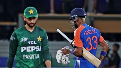 A despondent Salman Agha walks off across a determinded Hardik Pandya. It felt like a question of mentality: India let their cricket do the talking, while Pakistan couldn't walk their talk when it mattered most. (AFP) A despondent Salman Agha walks off across a determinded Hardik Pandya. It felt like a question of mentality: India let their cricket do the talking, while Pakistan couldn't walk their talk when it mattered most. (AFP)