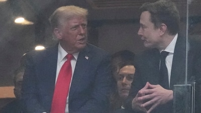 President Donald Trump, left, and Elon Musk talk during a memorial for Charlie Kirk. (AP) President Donald Trump, left, and Elon Musk talk during a memorial for Charlie Kirk. (AP)