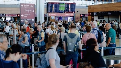 Passengers faced long queues in airports, along with delays and flight cancellations. (DPA via AP) Passengers faced long queues in airports, along with delays and flight cancellations. (DPA via AP)