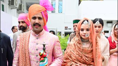 Himachal Pradesh minister Vikramaditya Singh with Amreen Kaur Sekhon after their wedding in Chandigarh on Monday. (Ravi Kumar/HT)