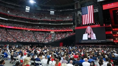 Mrs. Erika Kirk addresses the massive crowd that gathered at the memorial service for her husband, political activist Charlie Kirk at State Farm Stadium on September 21, 2025 in Glendale, Arizona. (Joe Raedle/AFP) Mrs. Erika Kirk addresses the massive crowd that gathered at the memorial service for her husband, political activist Charlie Kirk at State Farm Stadium on September 21, 2025 in Glendale, Arizona. (Joe Raedle/AFP)