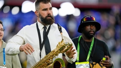 Former Philadelphia Eagles player Jason Kelce holds an instrument prior to an NFL football game between the Baltimore Ravens and the Detroit Lions. (AP) Former Philadelphia Eagles player Jason Kelce holds an instrument prior to an NFL football game between the Baltimore Ravens and the Detroit Lions. (AP)
