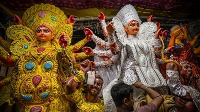 For decades, puja pandals in Bengal have served as mirrors to the political and cultural anxieties of their time. (PTI) For decades, puja pandals in Bengal have served as mirrors to the political and cultural anxieties of their time. (PTI)