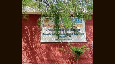 The address board of the Drug De-Addiction and Rehabilitation Centre in Sector 18, Chandigarh, is obscured by tree branches, making the centre easy to miss. (HT) The address board of the Drug De-Addiction and Rehabilitation Centre in Sector 18, Chandigarh, is obscured by tree branches, making the centre easy to miss. (HT)