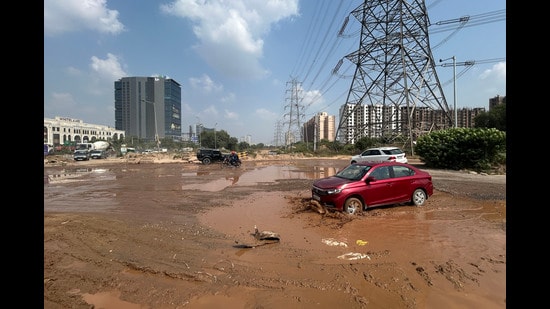 Deep potholes, poor lighting and unchecked heavy vehicles make SPR unsafe, with residents demanding lasting repairs over patchwork fixes. (Parveen Kumar/HT)
