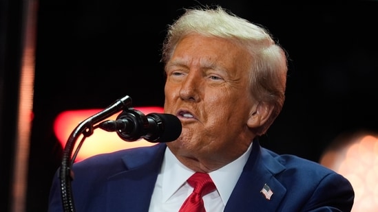 US President Donald Trump speaks at the memorial service held for conservative activist, Charlie Kirk at State Farm Stadium in Glendale, Arizona.(Julia Demaree Nikhinson/AP)