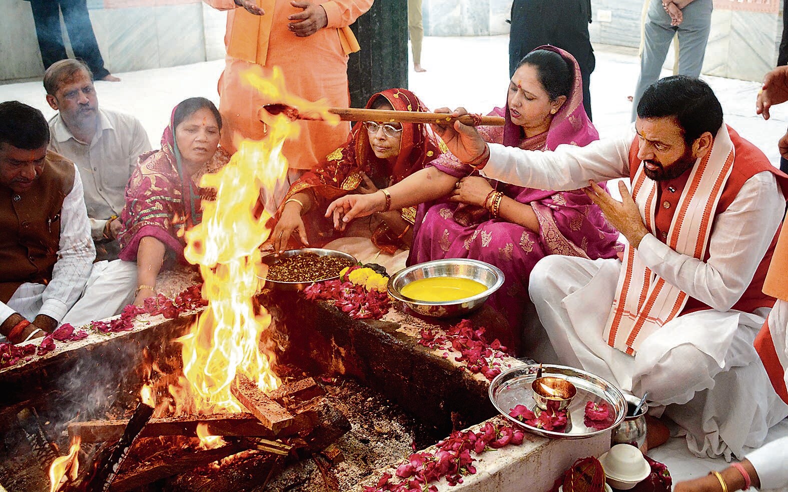 Haryana chief minister Nayab Singh Saini and his wife Suman Saini participating in a yagya at Mansa Devi Temple in Panchkula on Monday. (Sant Arora/HT)