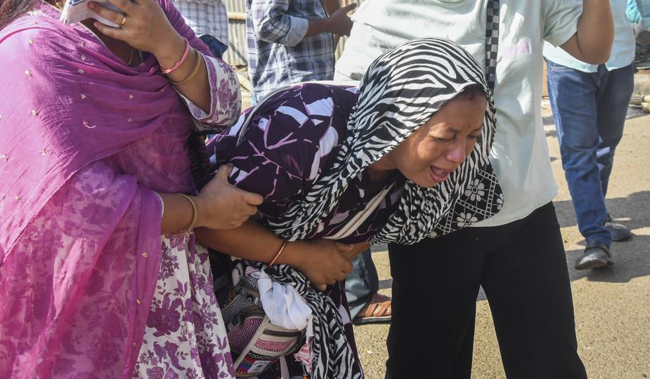 Grieving fans gather to pay their last respects to Assam’s cultural icon Zubeen Garg at Sarusajai stadium, in Guwahati on Monday (PTI)