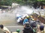 Bhubaneswar: Police use water cannons to disperse BJD workers marching towards the Odisha assembly (PTI) Bhubaneswar: Police use water cannons to disperse BJD workers marching towards the Odisha assembly (PTI)