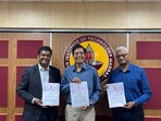 (L_R) Mr. Bhuvan Anandakrishnan, Vice President, Caterpillar Inc., Prof. V. Kamakoti, Director, IIT Madras & Prof. Manu Santhanam, Dean (ICSR), IIT Madras with the MoU