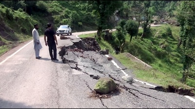 A caved-in road in Rajouri on Tuesday. (ANI) A caved-in road in Rajouri on Tuesday. (ANI)