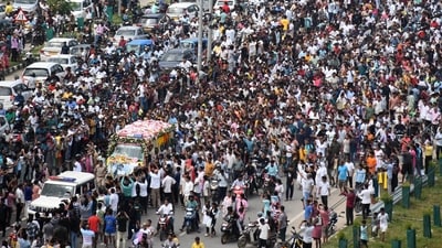 A crowd of mourning fans had gathered at the crematorium in Kamarkuchi before the last rites were performed. (ANI Photo) A crowd of mourning fans had gathered at the crematorium in Kamarkuchi before the last rites were performed. (ANI Photo)