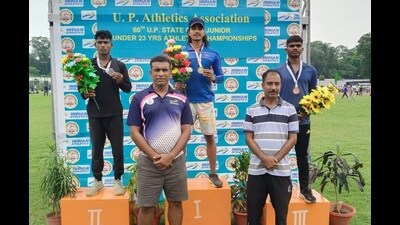 Priyanshu (centre) poses after creating a new national record in Prayagraj on Tuesday (Sourced) Priyanshu (centre) poses after creating a new national record in Prayagraj on Tuesday (Sourced)