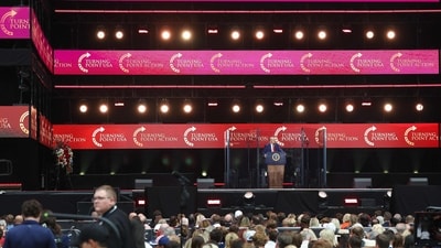US President Donald Trump speaks during the memorial service for political activist Charlie Kirk at State Farm Stadium. (Getty Images via AFP) US President Donald Trump speaks during the memorial service for political activist Charlie Kirk at State Farm Stadium. (Getty Images via AFP)