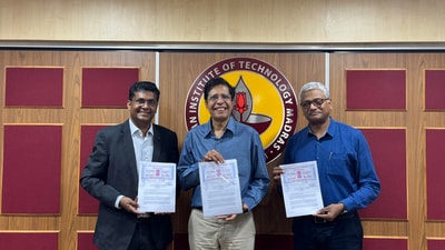 (L_R) Mr. Bhuvan Anandakrishnan, Vice President, Caterpillar Inc., Prof. V. Kamakoti, Director, IIT Madras & Prof. Manu Santhanam, Dean (ICSR), IIT Madras with the MoU (L_R) Mr. Bhuvan Anandakrishnan, Vice President, Caterpillar Inc., Prof. V. Kamakoti, Director, IIT Madras & Prof. Manu Santhanam, Dean (ICSR), IIT Madras with the MoU