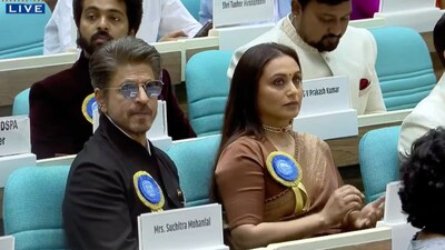 Shah Rukh Khan and Rani Mukerji sit among fellow winners. Shah Rukh Khan and Rani Mukerji sit among fellow winners.