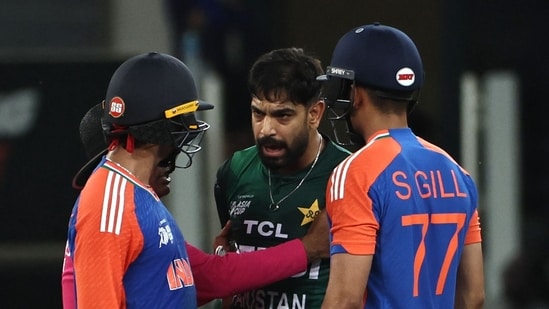 Pakistan's Haris Rauf (C) speaks with India's Abhishek Sharma (L) as Shubman Gill watches (AFP)