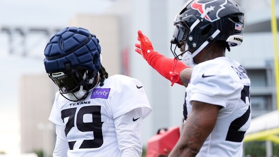 Houston Texans safety C.J. Gardner-Johnson, right, greets safety M.J. Stewart (29) during Back Together Weekend at the team's NFL football training camp Saturday, July 26, 2025, in Houston. (AP Photo/Ashley Landis) (AP)