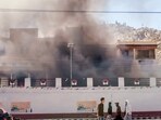 Smoke billows out from the Bhartiya Janta Party (BJP) Office as it set on fire during a massive protest over the statehood demand and the inclusion of Ladakh under the Sixth Schedule, in Leh.
