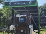An electric vehicle (EV) charging station at UP International Trade Show. (HT PHOTO)