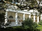 "The presidential walk of fame" is written on a wall, above pieces of brown paper placed in the colonnade outside the Oval Office