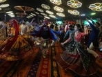 People wearing traditional attire perform Garba, a traditional dance of Gujarat state, on the first night of Navratri, or nine night festival, in Ahmedabad, India, Monday, Sept. 22, 2025. People wearing traditional attire perform Garba, a traditional dance of Gujarat state, on the first night of Navratri, or nine night festival, in Ahmedabad, India, Monday, Sept. 22, 2025.
