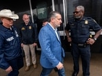 Dallas ICE facility shooting: U.S. Senator Ted Cruz (R-TX) leaves a press conference with Immigration and Customs Enforcement (ICE) acting field office director Joshua Johnson at the scene of a shooting at an ICE field office in Dallas, Texas, U.S., September 24, 2025.    REUTERS/Jeffrey McWhorter