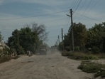 Military trucks on an unpaved road in the Donetsk region of Ukraine. Military trucks on an unpaved road in the Donetsk region of Ukraine.