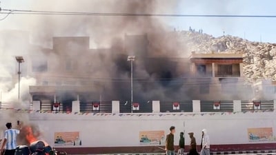 Smoke billows out from the Bhartiya Janta Party (BJP) Office as it set on fire during a massive protest over the statehood demand and the inclusion of Ladakh under the Sixth Schedule, in Leh. (ANI Video Grab) Smoke billows out from the Bhartiya Janta Party (BJP) Office as it set on fire during a massive protest over the statehood demand and the inclusion of Ladakh under the Sixth Schedule, in Leh. (ANI Video Grab)