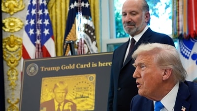 President Donald Trump speaks on H1B visa and new Trump Cards as Commerce Secretary Howard Lutnick listens in the Oval Office of the White House, (AP) President Donald Trump speaks on H1B visa and new Trump Cards as Commerce Secretary Howard Lutnick listens in the Oval Office of the White House, (AP)