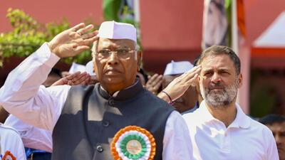 Congress president Mallikarjun Kharge and leader of Opposition in Lok Sabha, Rahul Gandhi, during the party's flag hoisting ceremony before the extended Congress Working Committee (CWC) meeting, in Patna, on Wednesday. (AICC)