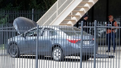 Dallas Police investigate the scene at 1120 Empire Central Place where a shooter opened fire (Getty Images via AFP) Dallas Police investigate the scene at 1120 Empire Central Place where a shooter opened fire (Getty Images via AFP)