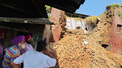 Recent heavy rains and flooding have inflicted severe damage on the historic Lahori Gate, the last surviving gate of the historical town of Sri Hargobindpur. A portion of this rare heritage structure has collapsed, putting its very existence at risk. (HT Photo) Recent heavy rains and flooding have inflicted severe damage on the historic Lahori Gate, the last surviving gate of the historical town of Sri Hargobindpur. A portion of this rare heritage structure has collapsed, putting its very existence at risk. (HT Photo)