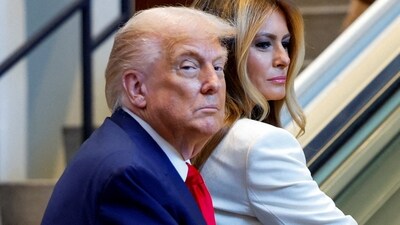 US President Donald Trump and first lady Melania Trump ride an escalator as they arrive to attend the 80th United Nations General Assembly, in New York City. (REUTERS)