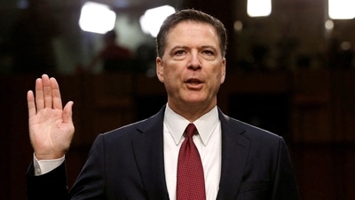 Former FBI Director James Comey is sworn in prior to testifying before a Senate Intelligence Committee (2017). (REUTERS)