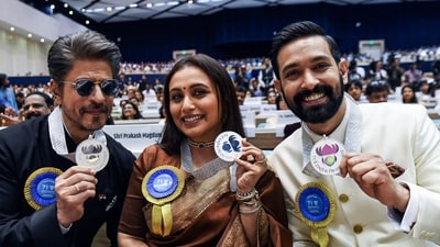 Shah Rukh Khan, Rani Mukerji and Vikrant Massey pose for a picture with their National Film Awards at the 71st National Film Awards at Vigyan Bhawan, in New Delhi, on Tuesday (ANI Photo/Rahul Singh). (Rahul Singh ) Shah Rukh Khan, Rani Mukerji and Vikrant Massey pose for a picture with their National Film Awards at the 71st National Film Awards at Vigyan Bhawan, in New Delhi, on Tuesday (ANI Photo/Rahul Singh). (Rahul Singh )