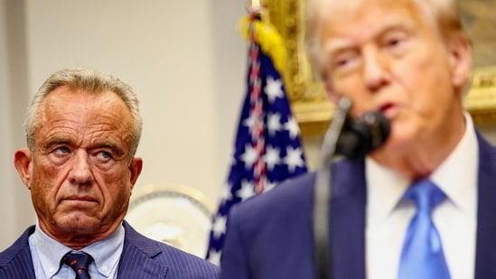 U.S. Secretary of Health and Human Services Robert F. Kennedy Jr. looks at U.S. President Donald Trump while he makes an announcement linking autism to childhood vaccines and to the use of popular pain medication Tylenol for pregnant women and children, claims which are not backed by decades of science, at the White House, in Washington, D.C., U.S., September 22, 2025. REUTERS/Kevin Lamarque (REUTERS)