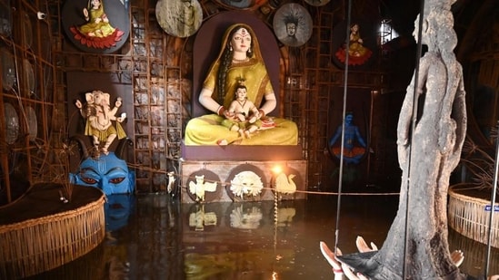 A waterlogged Durga Puja pandal in Kolkata on Tuesday.&nbsp;(Samir Jana/ Hindustan Times)