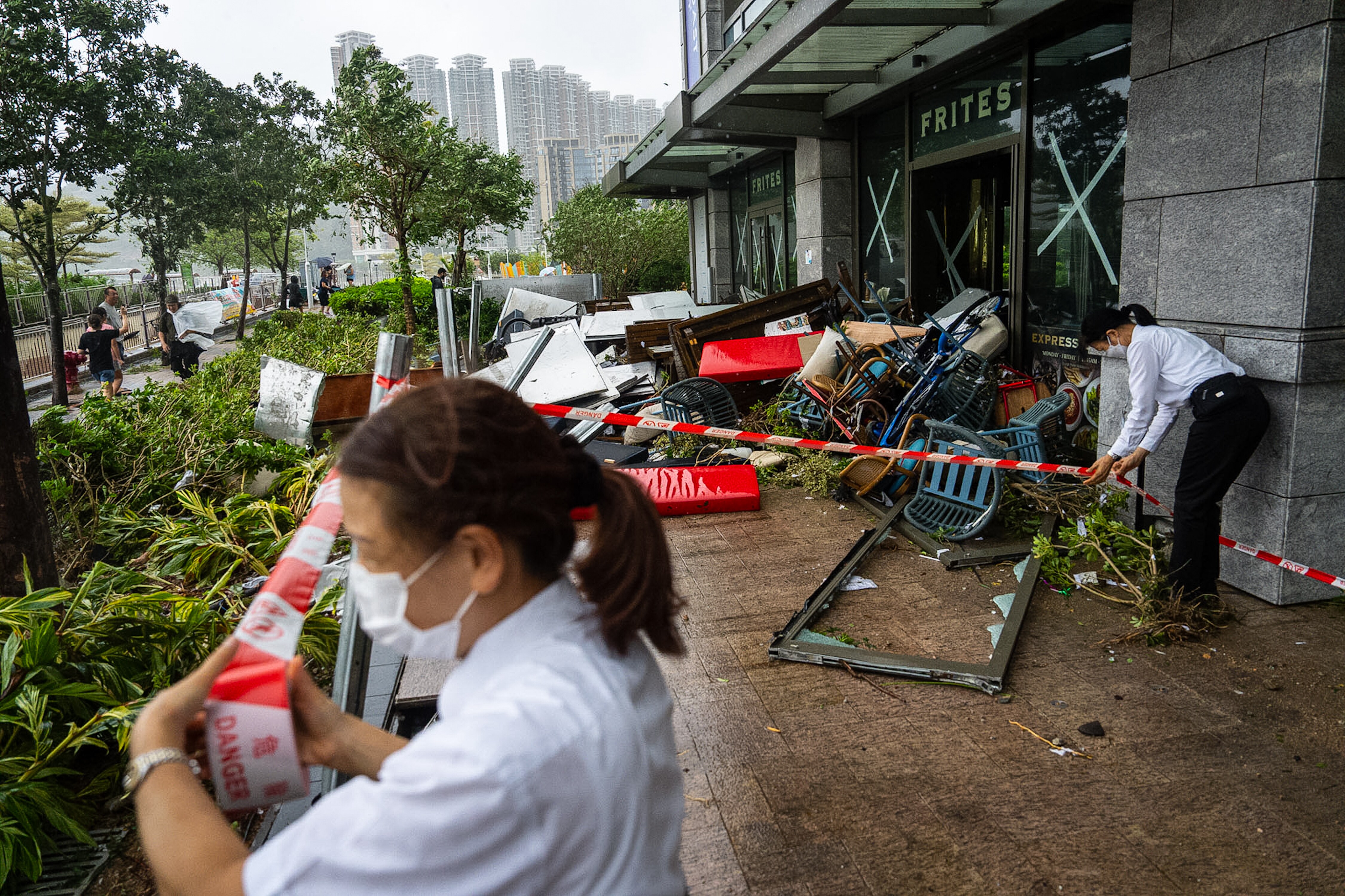 Furniture damaged by floodwater at a restaurant in Tseung Kwan O area, as super typhoon Ragasa approaches in Hong Kong, Wednesday, Sept. 24, 2025. (AP Photo/Chan Long Hei) (AP)